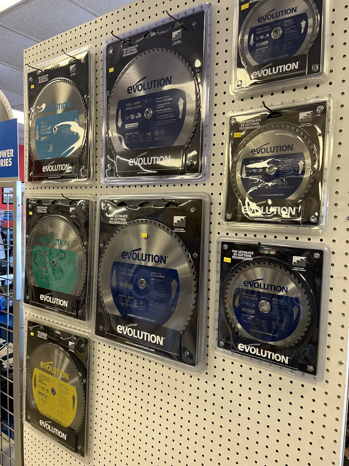 Evolution saw blades on a pegboard